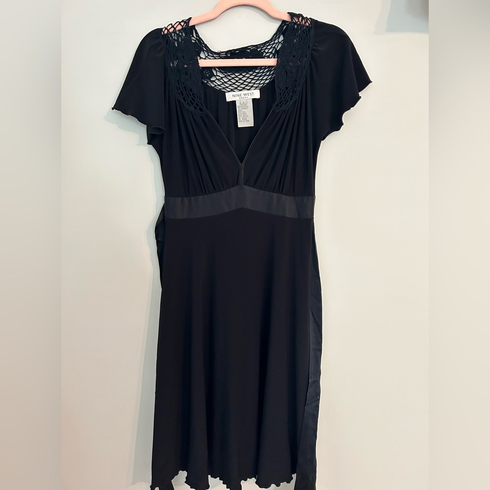 Black mid length flare skirt Nine West dress.